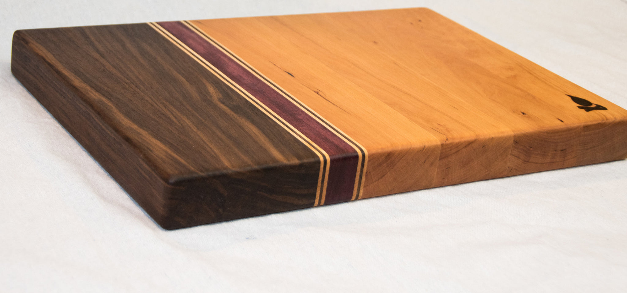 Handcrafted Wood Cutting Board - End Grain Walnut, Purple online Heart and Cherry. No slip bottom and easy grips. Cook like a pro with this board!